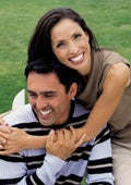 Happy Hispanic couple is smiling and has very clean, white, beautiful teeth.