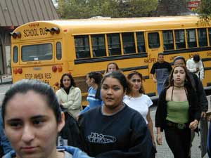 school bus and Latino students