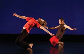 Two dancers perform on stage in the Fall 2003 Concert