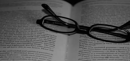 image of book with glasses
