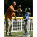 adult and child playing baseball