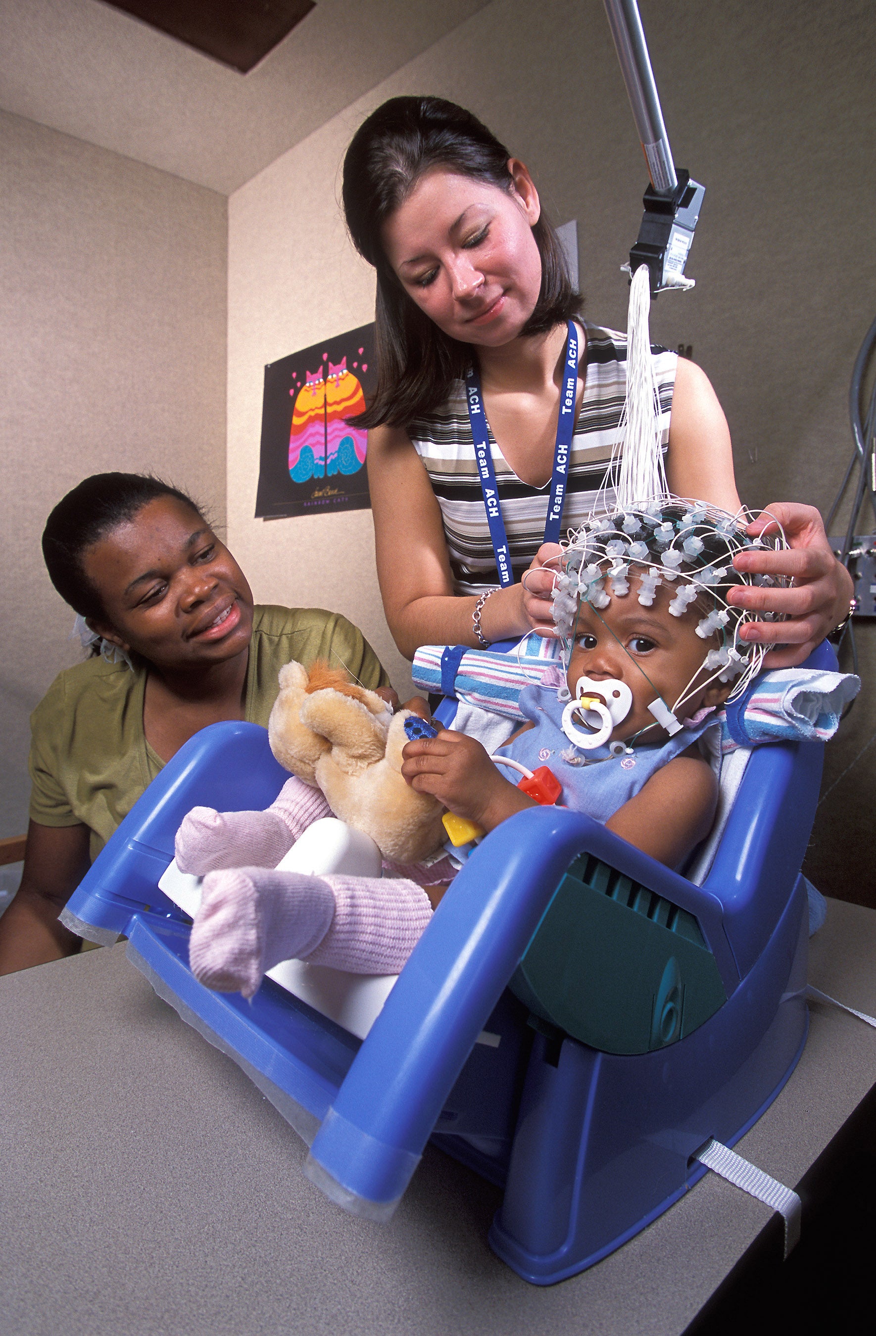 MOTHER AND BABY IN DOCTOR'S OFFICE