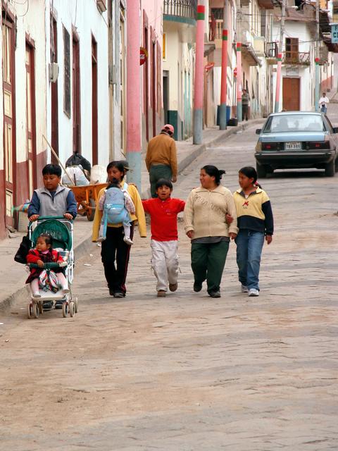 latino family walking together
