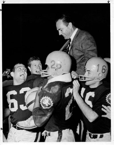 Frank Kush carried by ASU team, Homecoming victory, 1965