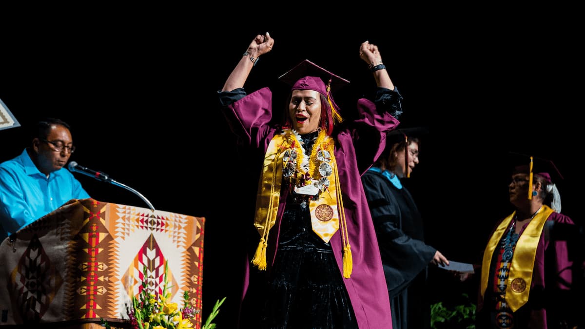 Student celebrates at graduation