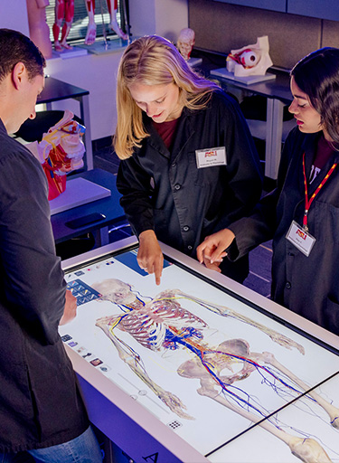 students at animatoge table