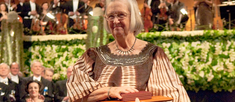 Elinor Ostrom accepting award at Nobel Prize award ceremony.